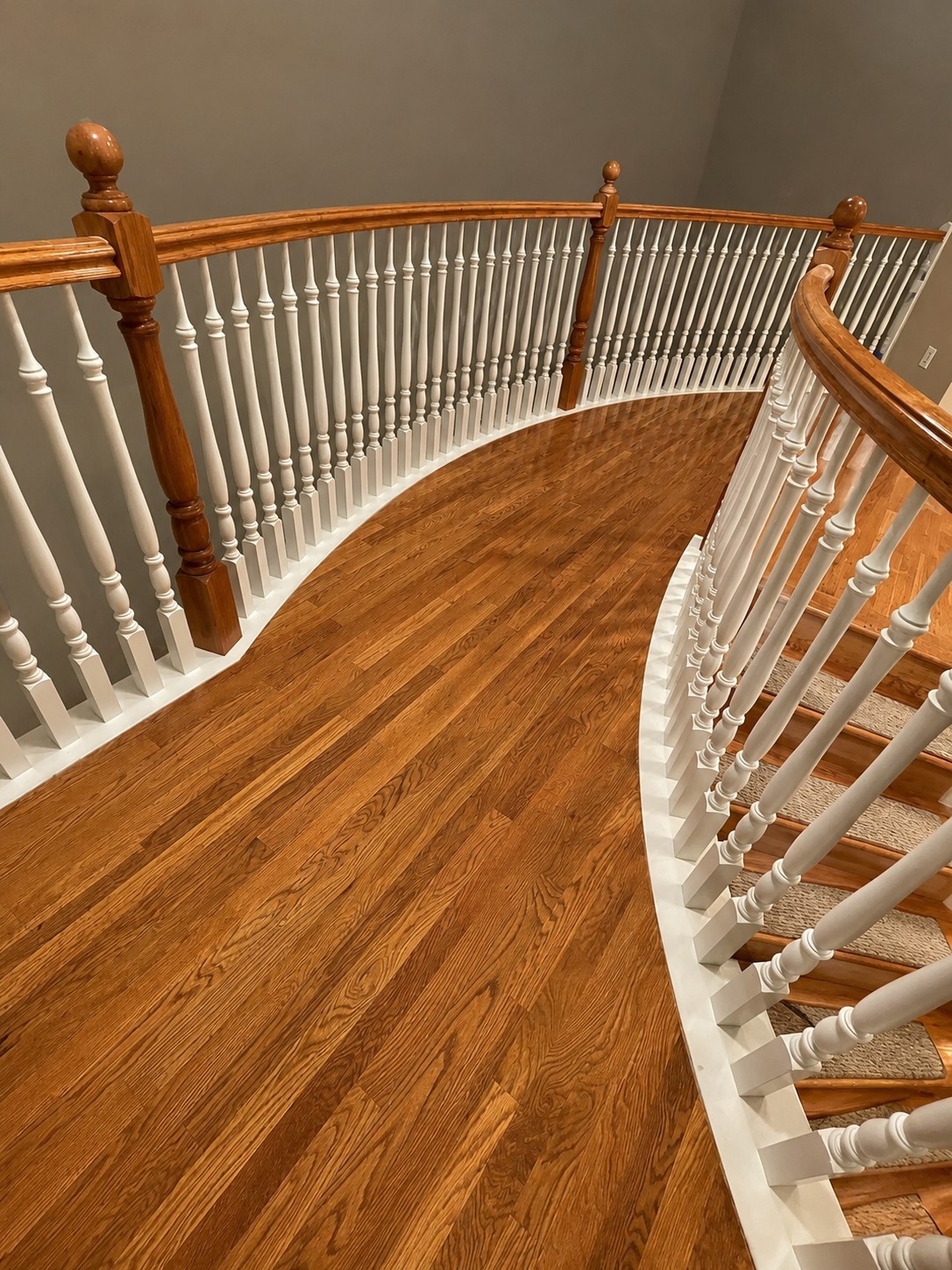 Curved staircase hardwood flooring Denver Colorado